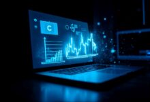 Gráficos financieros virtuales proyectados desde una computadora portátil en un entorno oscuro