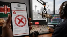 Phone with a false shutdown notice in front of an active radio studio
